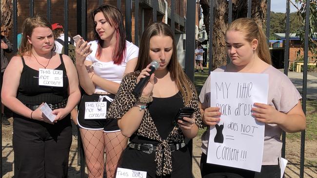 Natalia Nikolic (with mic) and Ngara Kennedy (right) talk at the protest. Picture: Amy Ziniak