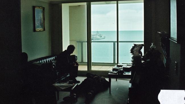 McCulloch in handcuffs on his apartment floor, in a police photo released by a court.