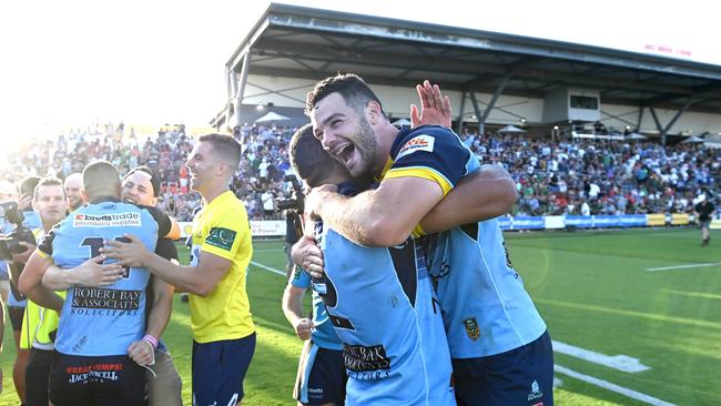 The Devils players celebrate victory after the 2021 QRL Intrust Super Cup Grand Final match between the Norths Devils and the Wynnum-Manly Seagulls at Moreton Daily Stadium on October 10, 2021, in Brisbane, Australia. (Photo by Bradley Kanaris/Getty Images)