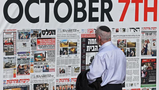 A man in Tel Aviv reviews the latest news about Israeli captives held in the Gaza Strip since the October 7, 2023 attacks by Hamas militants. Picture: AFP