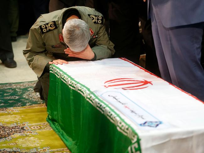 Iran’s leaders wept over Soleimani’s coffin. Picture: IRANIAN SUPREME LEADER'S WEBSITE / AFP