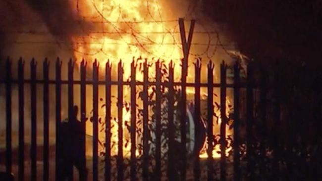 This image made from video shows a burning helicopter in a parking lot outside the King Power Stadium in Leicester, England shortly after a Premier League game on Saturday, Oct. 27, 2018. (Pool Photo via AP)