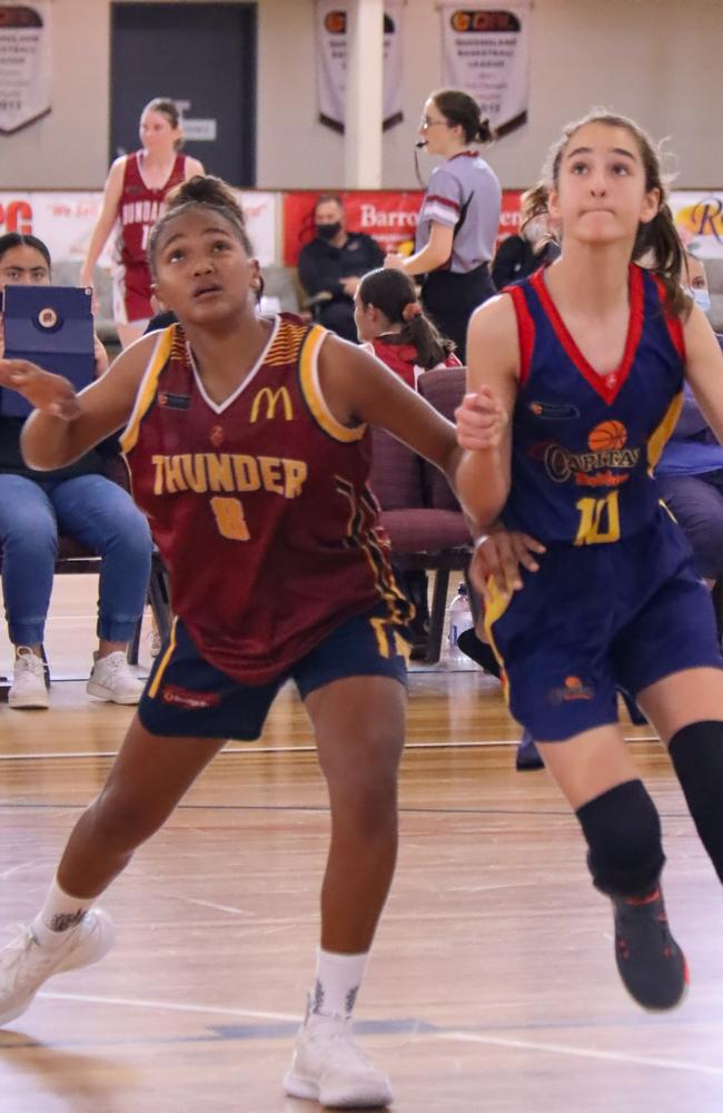 Logan Thunder's Mia Nakata battling it out against Brisbane on day two. Picture: Basketball Queensland