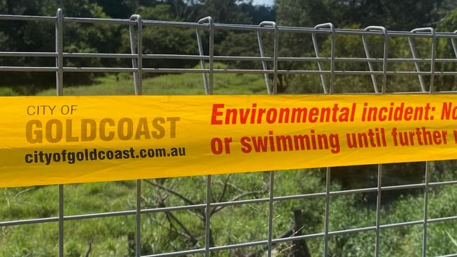 Sewer spill in the northern Gold Coast at the Albert River. Signage by the Gold Coast City Council.
