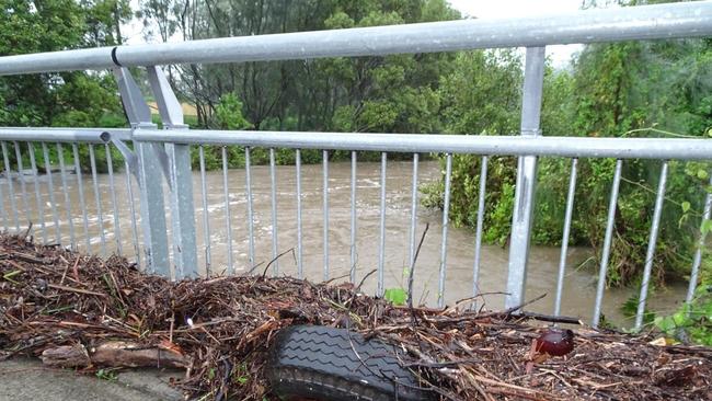 Debris on a bridge at Siganto Drive, Hope Island. Picture: Genevieve Faulkner