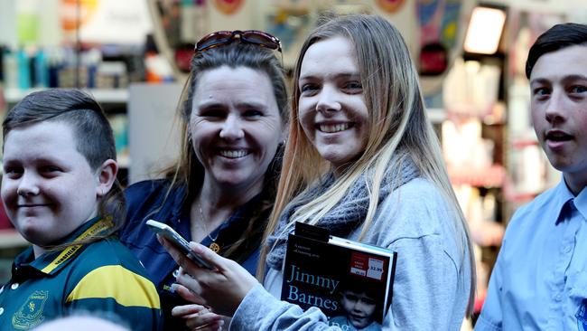 Some of the younger fans who came for Jimmy Barnes’ autograph.