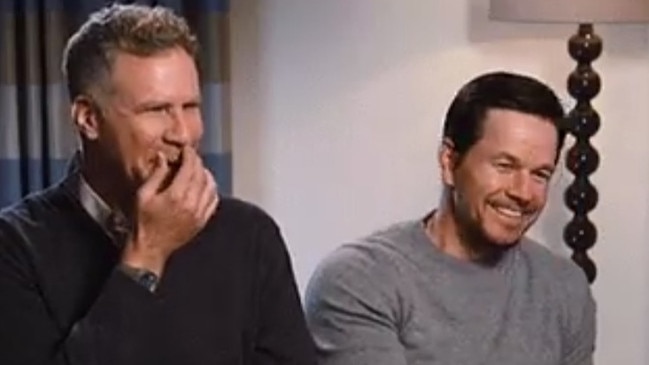 He did at least smile! Ferrell (left) and Wahlberg chat to Helliar in 2017.