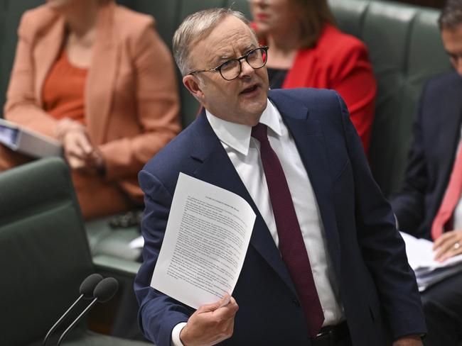 Anthony Albanese holds up the Uluru Statement. Picture: Martin Ollman/NCA NewsWire