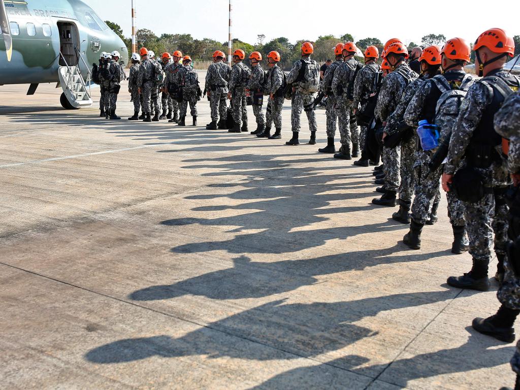 Backed by military aircraft, Brazilian troops on Saturday were deploying in the Amazon to fight fires that have swept the region and prompted anti-government protests as well as an international outcry. Picture: Sérgio Lima/ AFP