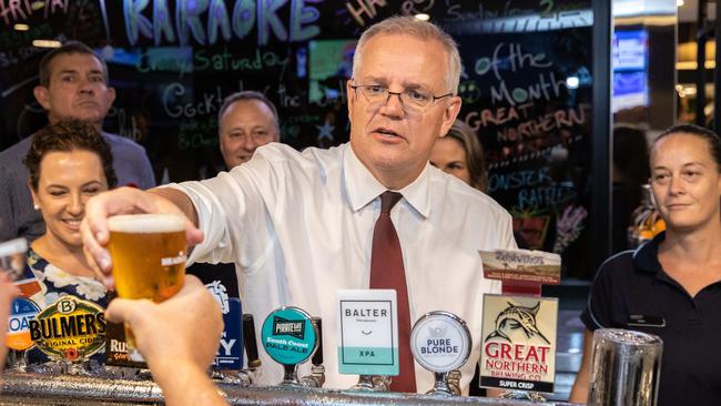 ELECTION TEAM 2022LIBERAL BUS TOUR 25/4/2022Prime Minister Scott Morrison at Cazalys Palmerston Club to play Two Up on ANZAC day in Darwin NT.Ms Lia Finocchiaro MLA (Leader of the Opposition for the Northern Territory), Mr Damian Ryan (CLP Candidate for Lingiari), Ms Tina MacFarlane (CLP Candidate for Solomon) and Ms Jacinta Price (CLP Senate Candidate for the NT) will be there.The PM flips the first round of two-up.Picture: Jason Edwards