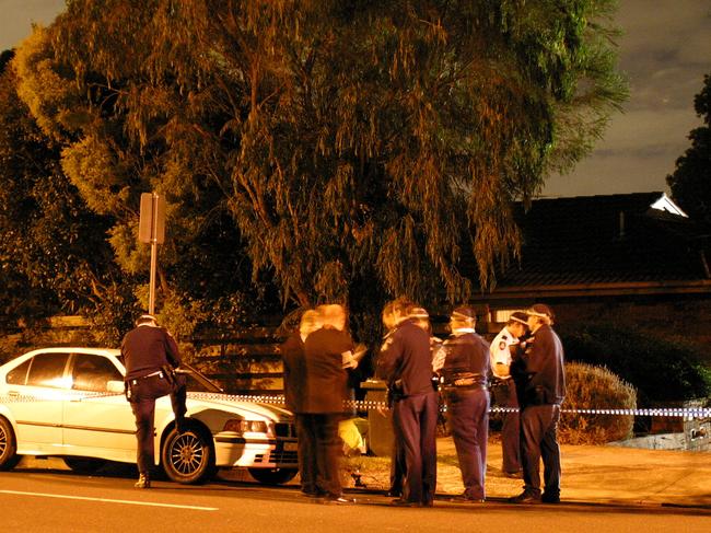 Police at the scene when the pair were killed in East Kew.