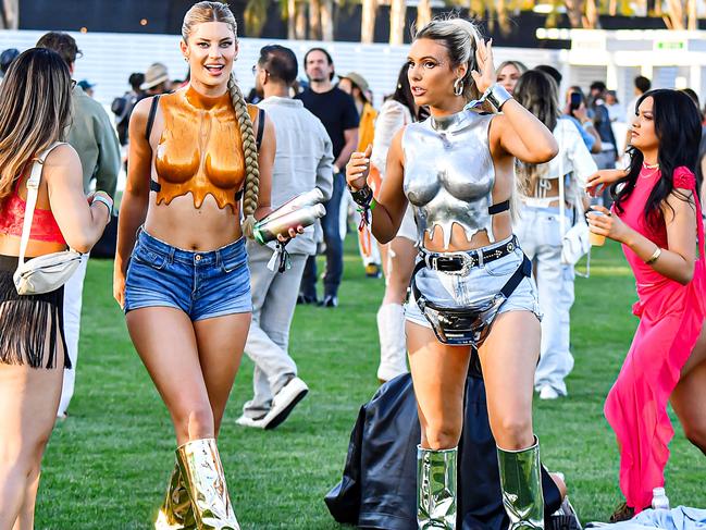 Lele Pons and Hannah Stocking wore matching metallic tops. Picture: @CelebCandidly / MEGA