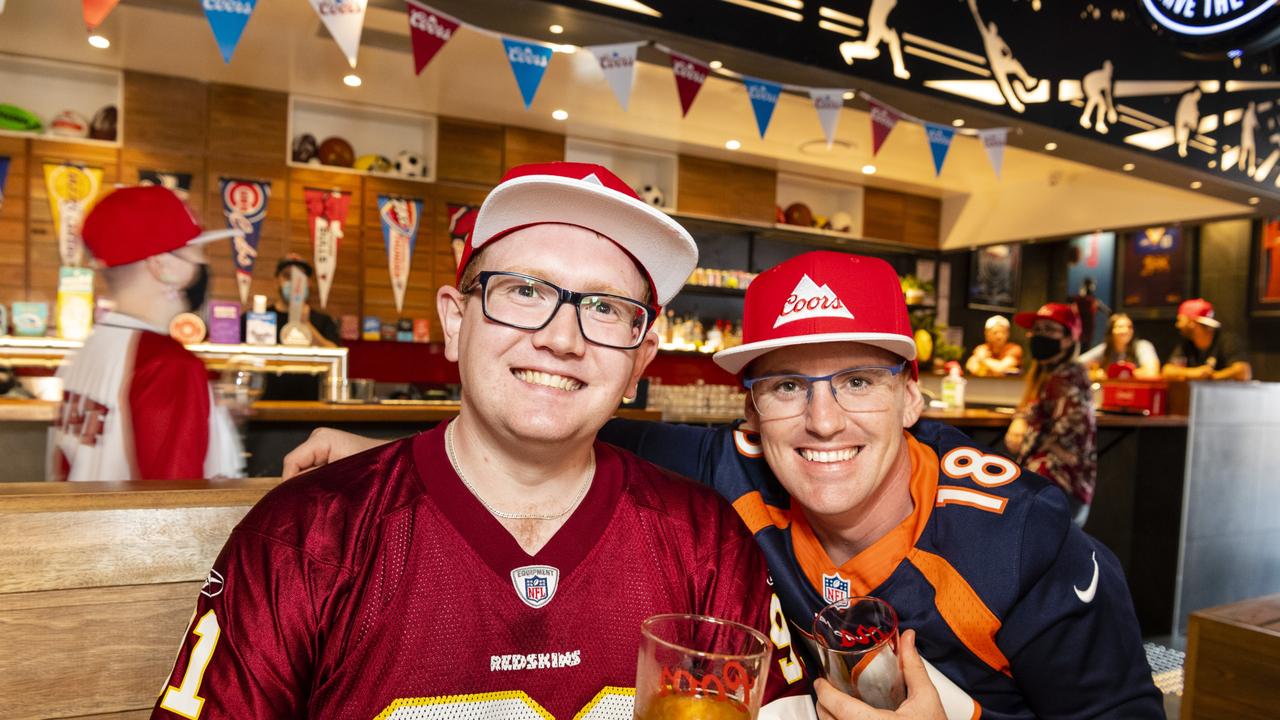 Sean Vettiger (left) and Ashley Warren watch the NFL Super Bowl at Tailgate Sports Bar, Monday, February 14, 2022. Picture: Kevin Farmer