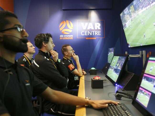 A-League will trial a new centralised video ref system on Saturday night during the FFA Cup semifinal.The VAR Centre based in NEP building, Everleigh, Sydney.R to L: Richard Naumovski (Assistant VAR) Kris Griffiths-Jones (VAR) Kurt Ams (VAR) Kishen Kartages (Hawk Eye Operator)Photo: Tim Pascoe