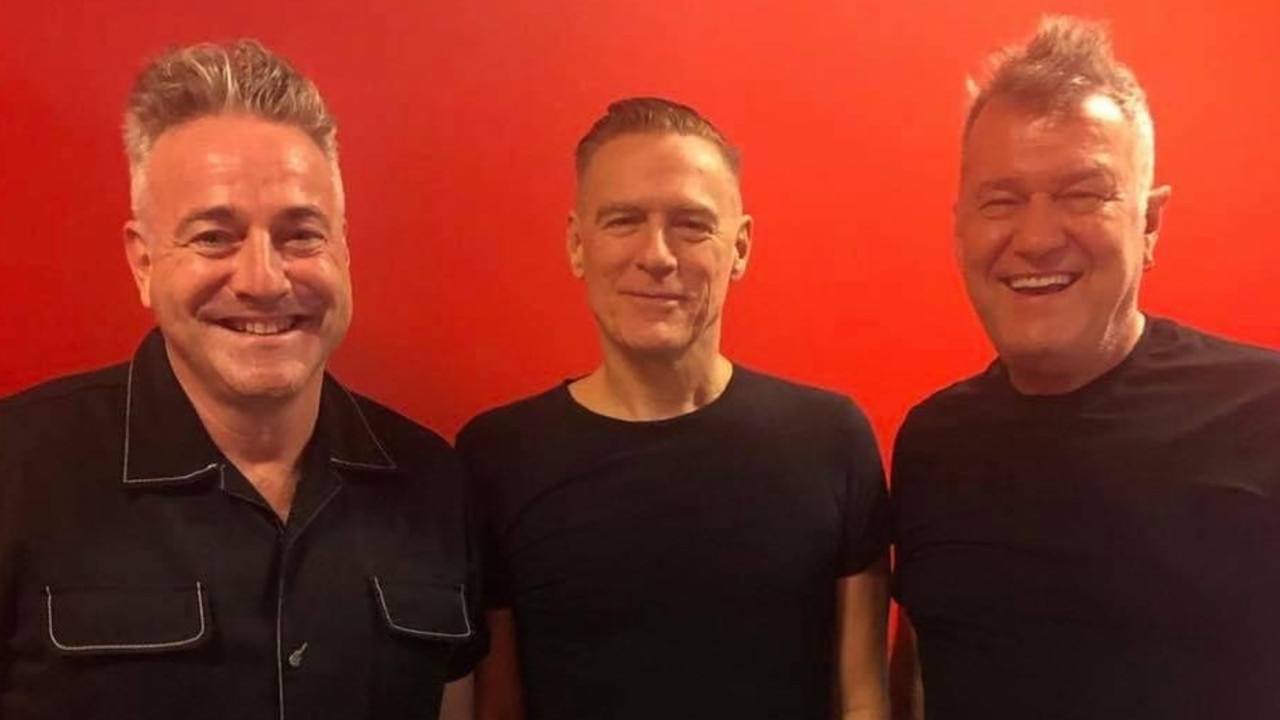 Field and Barnes backstage with Bryan Adams. Picture: Supplied