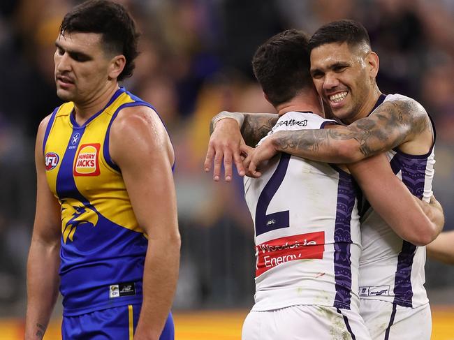 PERTH, AUSTRALIA - AUGUST 12: Jaeger O'Meara and Michael Walters of the Dockers celebrate a goal during the round 22 AFL match between West Coast Eagles and Fremantle Dockers at Optus Stadium, on August 12, 2023, in Perth, Australia. (Photo by Paul Kane/Getty Images)