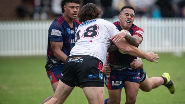 Campbelltown Collegians No.7 Nautu’a Masima takes on the Oakdale defence. Pics by Julian Andrews.