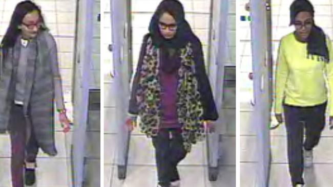 Kadiza Sultana, left, Shamima Begum, centre, and Amira Abase go through security checkpoints at Gatwick airport before catching a flight to Turkey and then joining Islamic State. Picture: AP