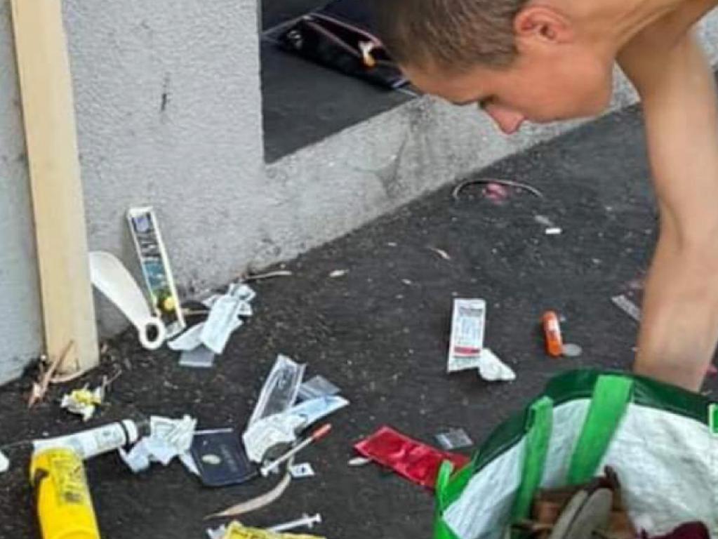 Needles scattered on the ground in St Kilda.