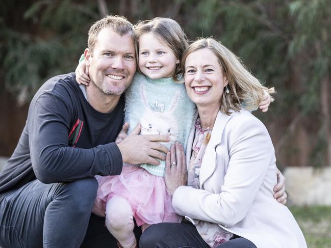 Rebecca White with husband Rod and daughter Mia. Picture: Eddie Safarik