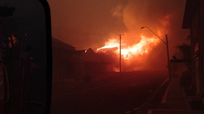 The fire approaches Cobargo before dawn. Picture: Neil Crawle