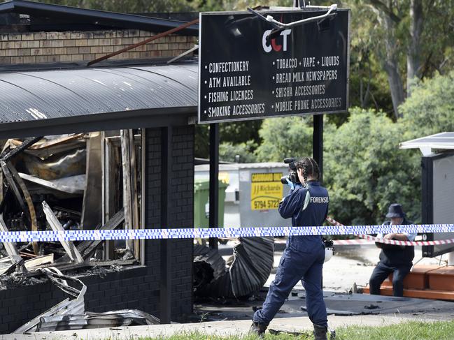 Police investigate a suspicious overnight fire at a tobacconists on Bridgewater Road Craigieburn. Picture: Andrew Henshaw