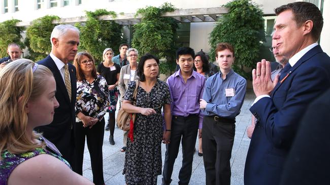 Prime Minister Malcolm Turnbull and Social Services Minister Christian Porter with participants of a NDIS trial in the ACT. Picture: Kym Smith