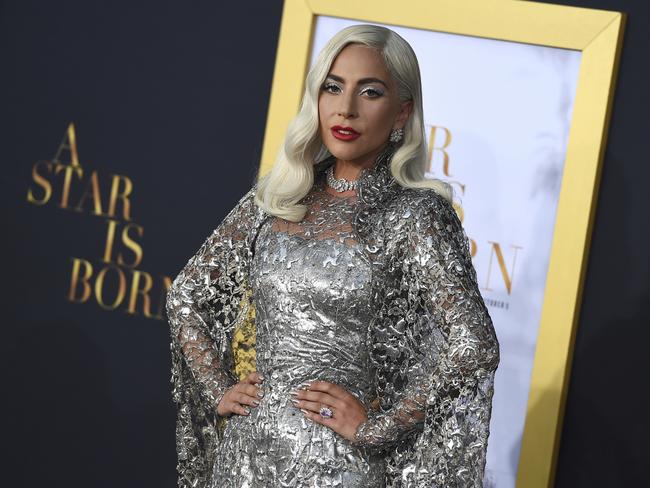 FILE - In this Sept. 24, 2018 file photo, Lady Gaga arrives at the Los Angeles premiere of "A Star Is Born," at the Shrine Auditorium. Lady Gaga is nominated for several Grammy Awards including one for record of the year and song of the year. The Grammy Awards will be held on Sunday. (Photo by Jordan Strauss/Invision/AP, File)