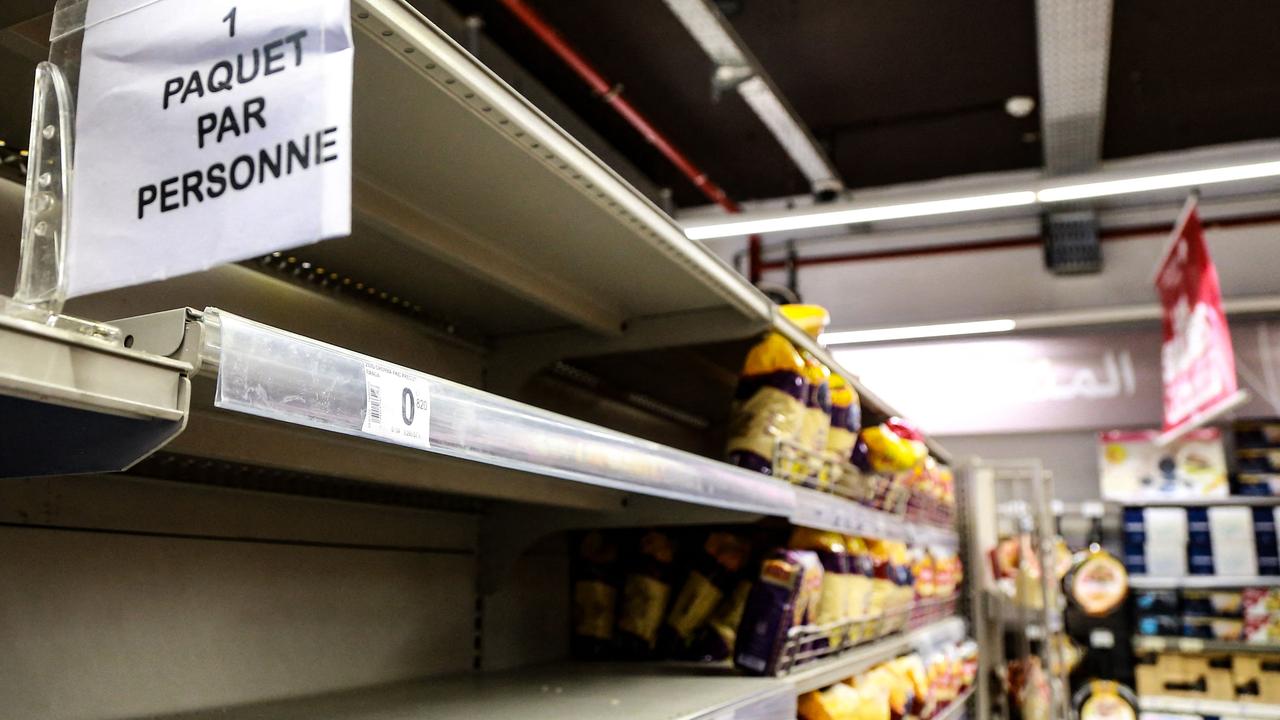 Almost empty shelves of bread and other wheat-based food products at a supermarket in the Tunisian capital Tunis. Picture: Anis MILI / AFP.