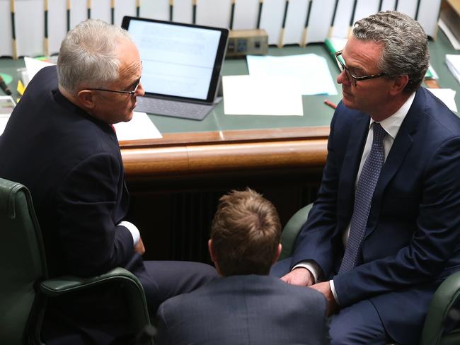 Then PM Malcolm Turnbull, Christian Porter and Christopher Pyne talking in Question Time in the House of Representatives in Parliament House in Canberra. Picture: Kym Smith