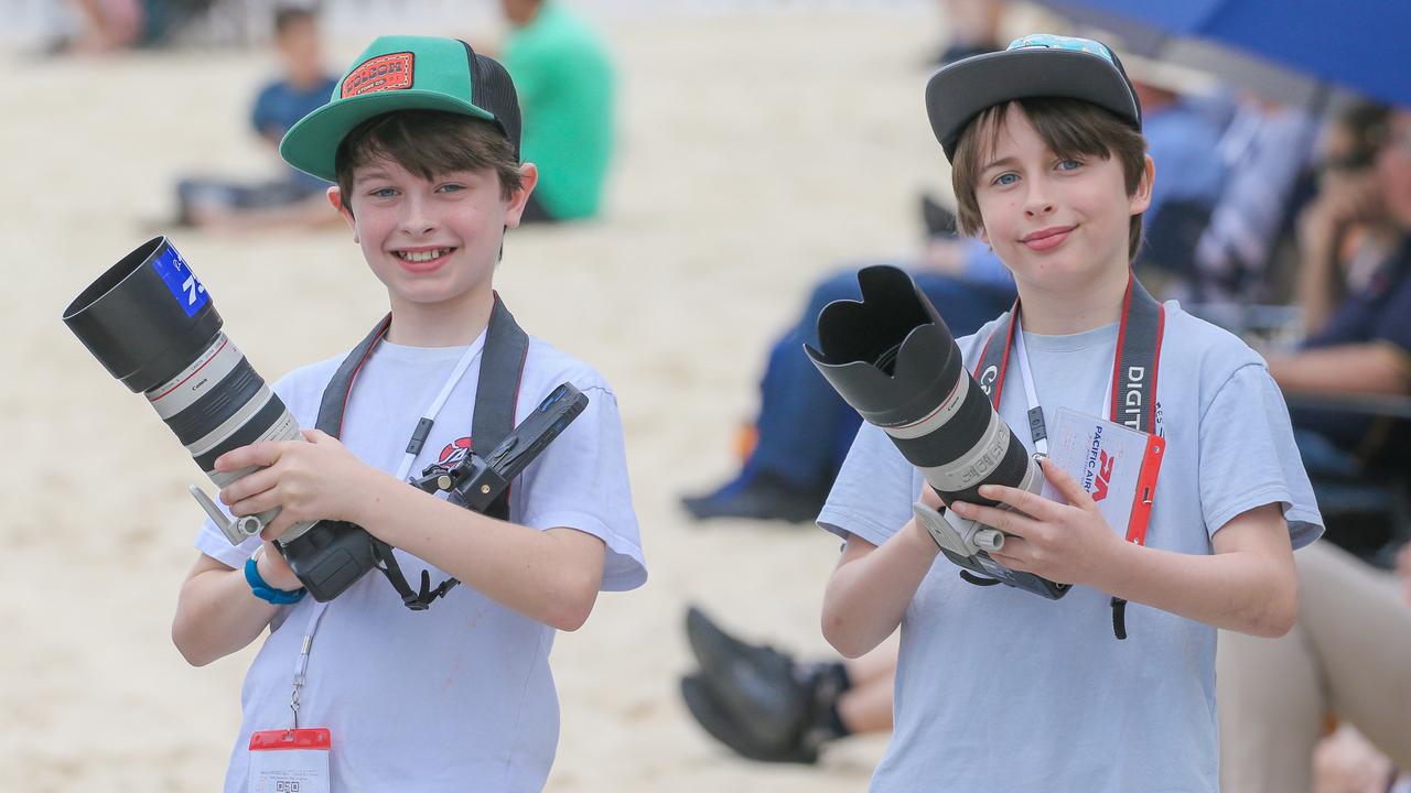 Young Photographers Ewan and Hamish McGrath enjoying the inaugural Pacific Air Show over Surfers Paradise. Picture: Glenn Campbell