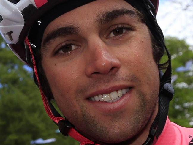 Pink jersey, Australian Michael Matthews, poses before the start of the 3rd stage of the 97th Giro d'Italia, Tour of Italy, cycling race from Armagh to Dublin (187 km) on May 11, 2014 in Belfast. AFP PHOTO/LUK BENIES