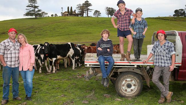 Simon and Dianne Barnes on their dairy farm near Orbost with sons Jack, Darcy, Lockie and Hugh. Picture: Ian Currie