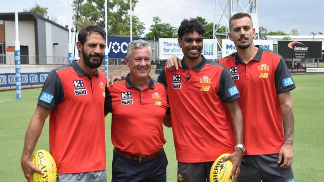 Gold Coast Suns' Ben Long, Lloyd Johnston and Joel Jeffrey alongside club CEO Mark Evans at TIO Stadium.. Picture: Elise Graham.