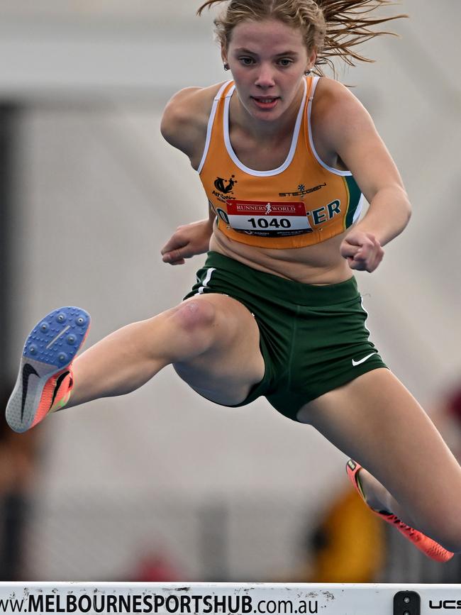 Eliza Chivers competes in the Women U17 Hurdles.