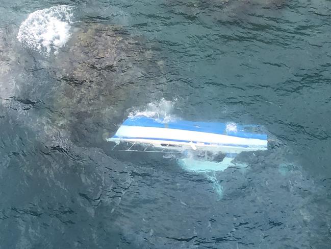 A boat has sunk off Scawfell Island, 60km from Mackay, stranding six people. Photo: RACQ CQ Rescue