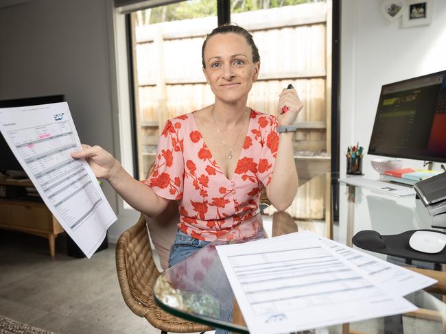 Trina Raymond, 42, Trina checks every payslip to make sure she is on top of her finances. Picture: Jason Edwards