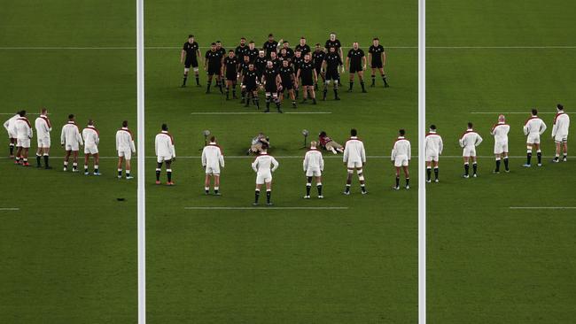 England line up in front of the All Blacks’ haka. Picture: AFP