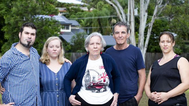 Rochedale South residents fed up with youth crime in the area. Vivian McDermott (middle) poses for a photograph with Rochedale South residents in 2020. (AAP Image/Renae Droop)