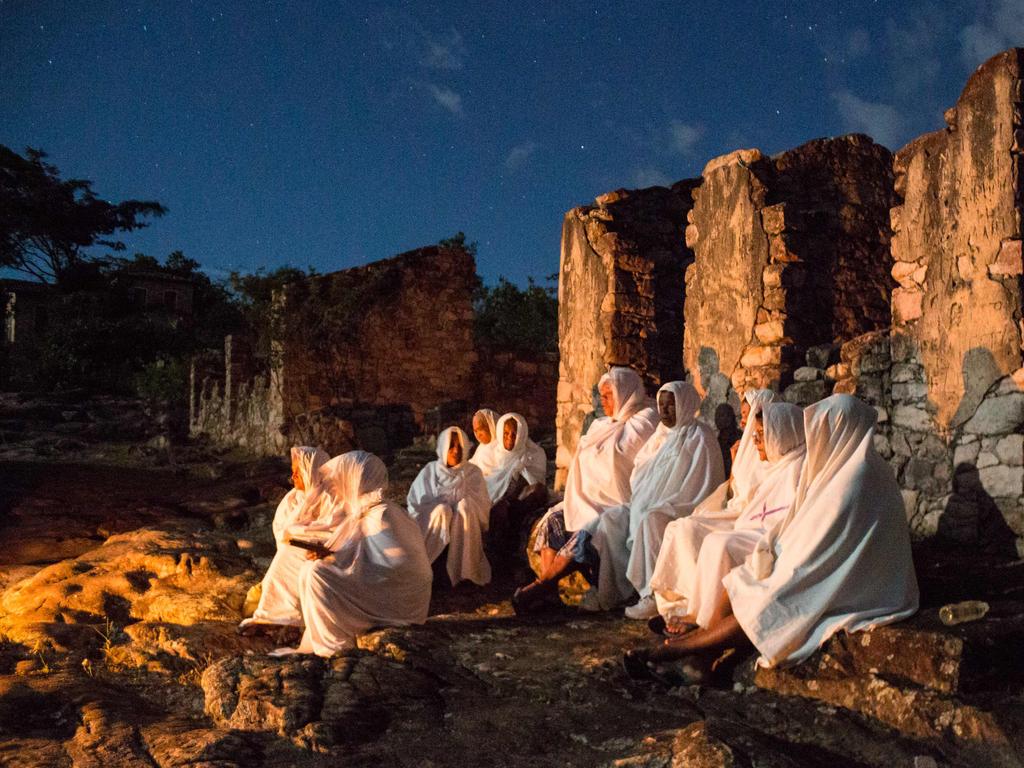 Catholic women in white sheets participate in the Terno das Almas procession in Brazil’s Chapada Diamantina National Park, as part of a Holy Week ritual to pray for their departed. Picture: Antonello Veneri/AFP
