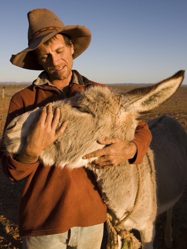 A Portrait of Australia: The best stories from 30 years of Australian Geographic. Gill Wheadon and Bella, Calcutta Outstation, Mt Lyndhurst, Strzelecki Track, South Australia Photo by Bill Bachman