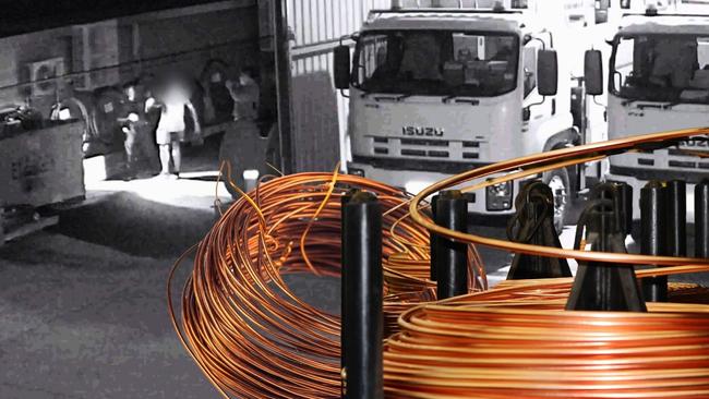 Police and security guards arrest a man trying to steal copper wire from a Scenic Rim work depot. Picture: Ergon