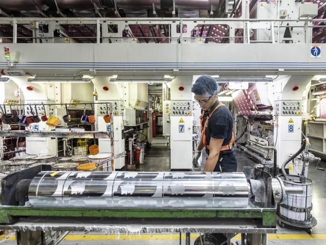 An operator sets up a printing machine inside an Amcor Ltd. packaging plant in Lugo di Vicenza, Italy, on Thursday, Sept. 13, 2018. Australia's Amcor agreed to acquire U.S. competitor Bemis Co. in an all-stock deal to expand sales of plastic packaging in the Americas. Photographer: Alberto Bernasconi/Bloomberg via Getty Images