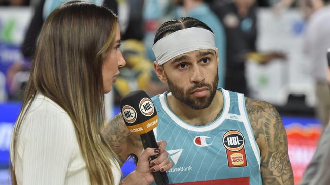 HOBART, AUSTRALIA - FEBRUARY 08: Jordon Crawford of the Jackjumpers speaks with Kelsey Browne after the round 20 NBL match between Tasmania Jackjumpers and Cairns Taipans at MyState Bank Arena, on February 08, 2025, in Hobart, Australia. (Photo by Simon Sturzaker/Getty Images)