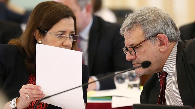 Queensland Premier Annastacia Palaszczuk speaks with chief of staff David Barbagallo during estimate hearings last month. Picture: AAP