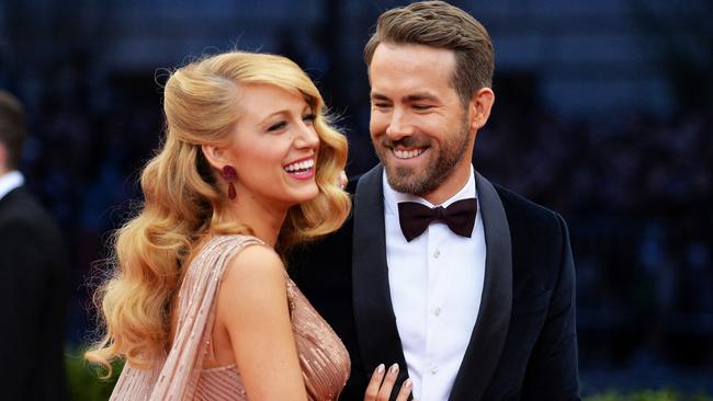 NEW YORK, NY - MAY 05: Actors Blake Lively (L) and Ryan Reynolds attend the "Charles James: Beyond Fashion" Costume Institute Gala at the Metropolitan Museum of Art on May 5, 2014 in New York City. (Photo by Mike Coppola/Getty Images)