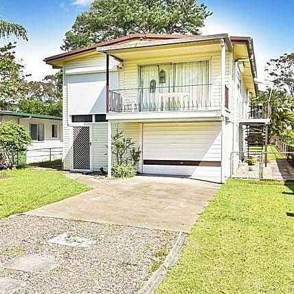 This house at 862 Gympie Rd Lawnton will be demolished to make way for a new service station, if it is approved by Moreton Bay Regional Council. Photo: David Deane