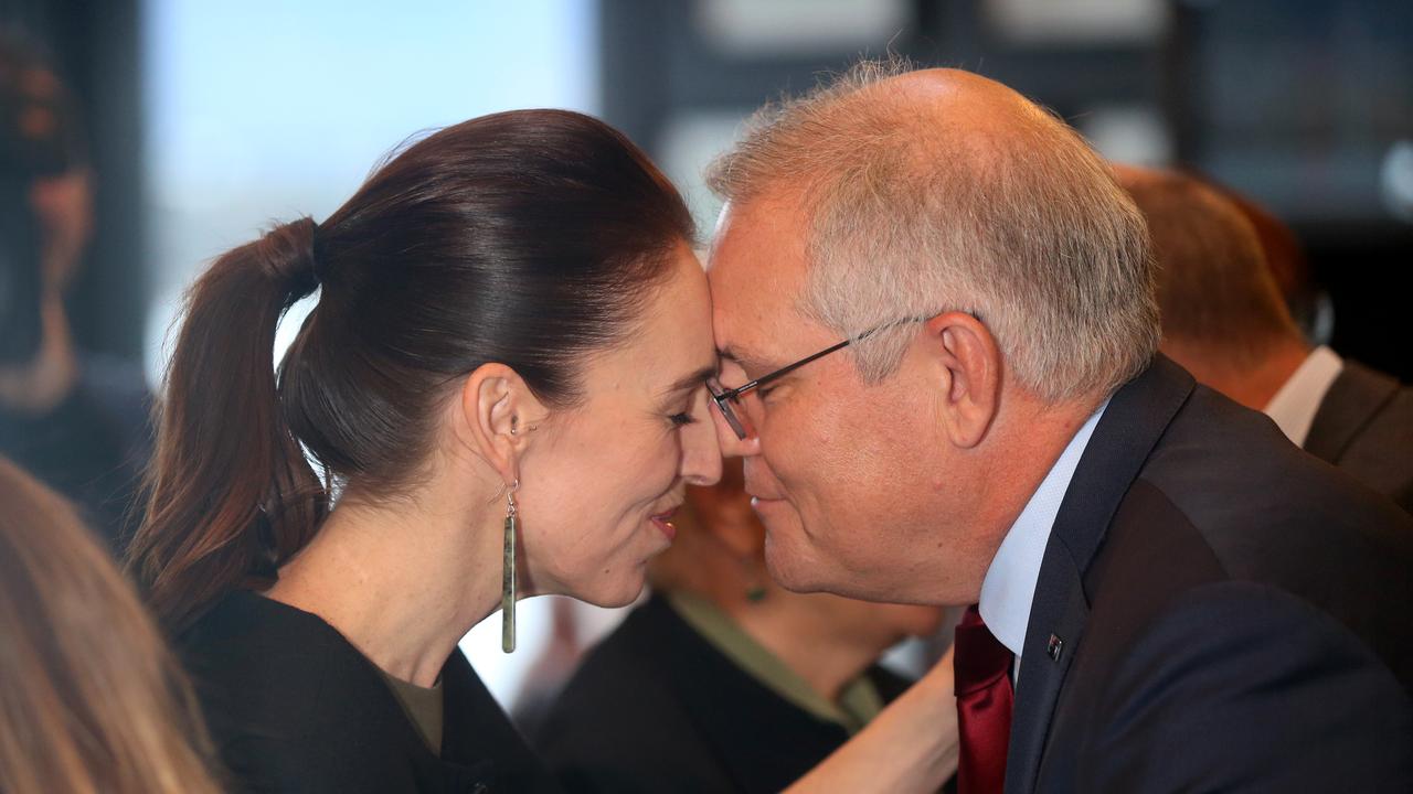 New Zealand Prime Minister Jacinda Ardern gives former Australian prime minister Scott Morrison a traditional hongi greeting. Picture: NCA NewsWire / Picture Calum Robertson
