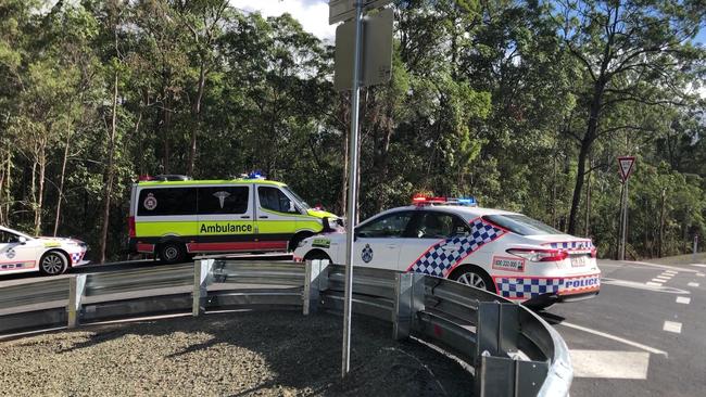 Police and an ambulance at the dangerous hairpin turn at Riedel Rd after a man had a medical episode on Beenleigh Redland Bay Rd