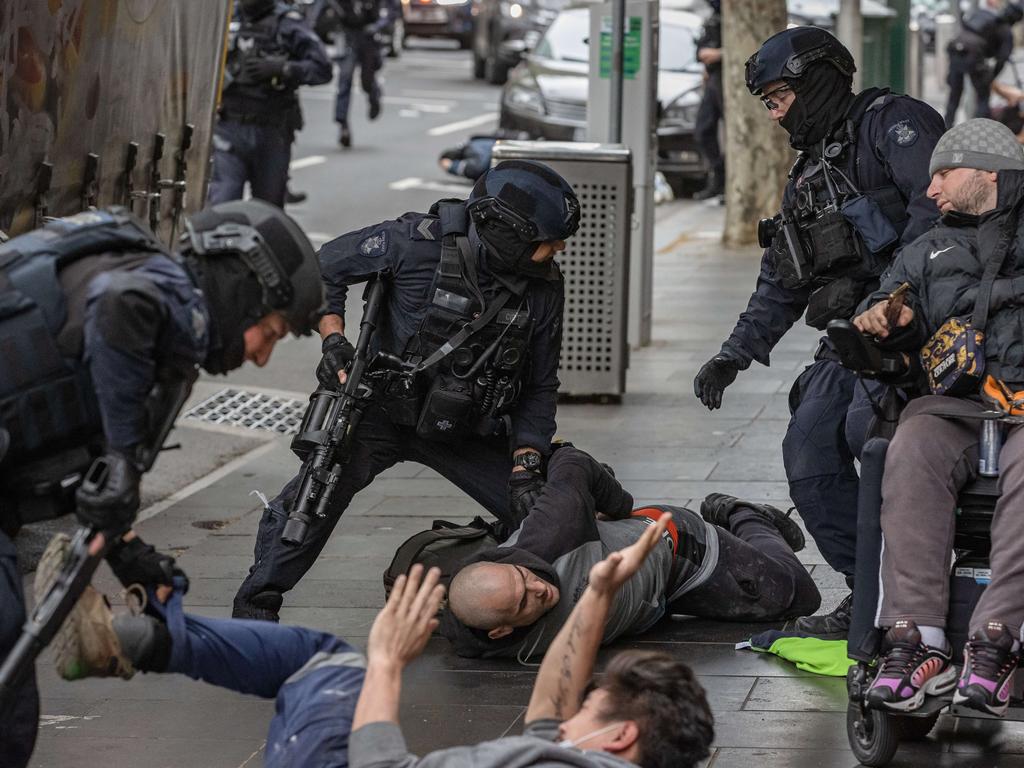 Police arrest anti-lockdown and anti-vax protesters in Melbourne. Picture: Jason Edwards